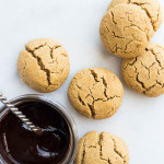Espresso Cookies with Chocolate Frosting: Put a little pep in your cookie! These gluten free, vegan, and refined sugar-free cookies melt in your mouth, and the chocolate frosting is super thick and creamy! || fooduzzi.com recipe