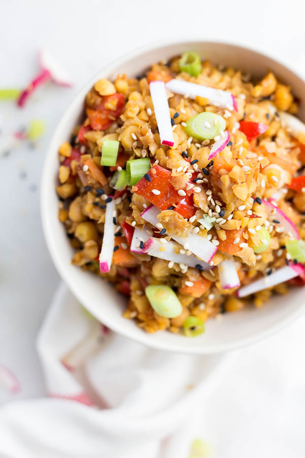 fried rice made with chickpeas in a bowl with vegetables