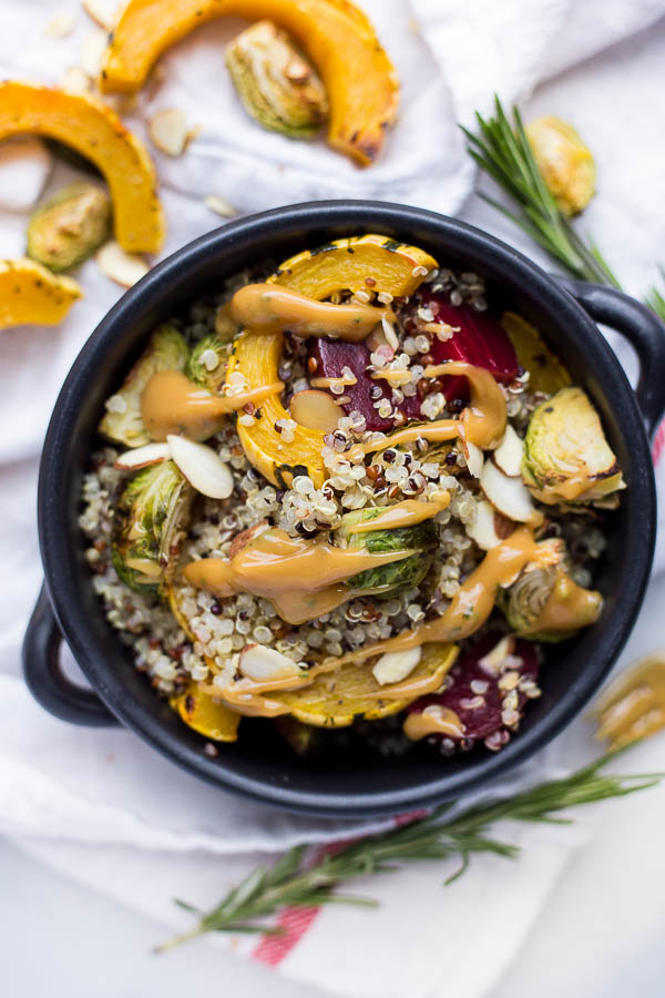 Harvest Quinoa Bowls with Maple Almond Rosemary Sauce: these bowls are vegan, gluten free, and full of fall vegetables! The thick and creamy maple almond rosemary sauce is not to be missed! || fooduzzi.com recipe