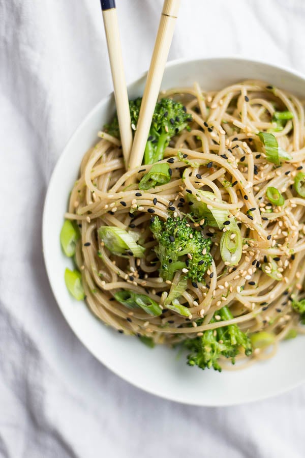 ginger garlic noodles in a bowl with broccoli