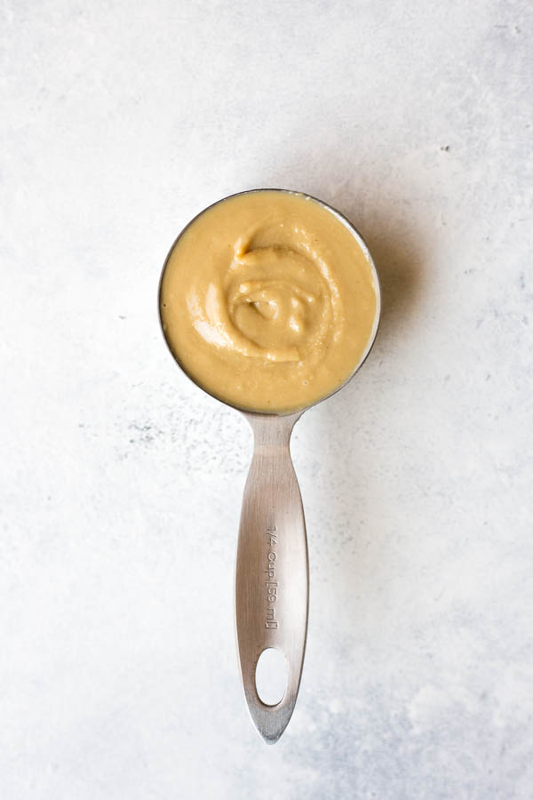 Crazy Addictive 4-Ingredient Lemon Tahini Sauce: One of my favorite sauces for any occasion! It only requires 4 ingredients, and it's naturally gluten free and vegan. Try it on tacos, salads, veggie trays, or lettuce wraps! || fooduzzi.com recipes