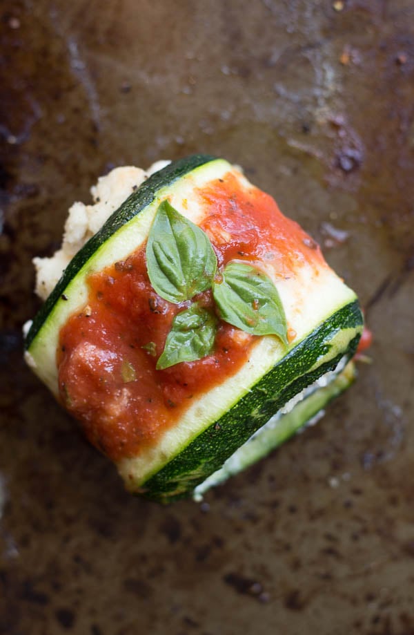 Cheesy Vegan Zucchini Roll Ups: These Cheesy Vegan Zucchini Roll Ups are light and flavorful and perfect for a spring and summer dinner. Naturally vegan and gluten free! || fooduzzi.com recipe