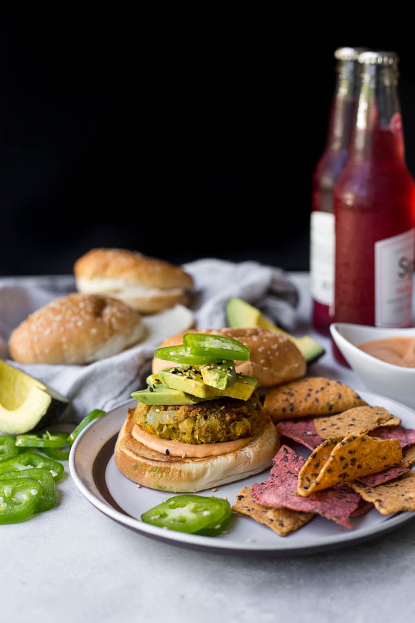 Vegan Curry Chickpea Burgers: One of the best veggie burgers I've ever had! Naturally gluten free and vegan, you will LOVE these chewy, flavorful chickpea burgers! || fooduzzi.com recipe