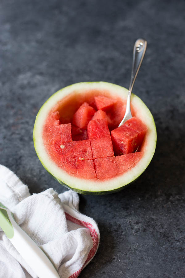 How to Make a Watermelon Bowl: A simple way to dress up your summer dishes! Perfect for serving salads, fruits, and more! || fooduzzi.com recipe