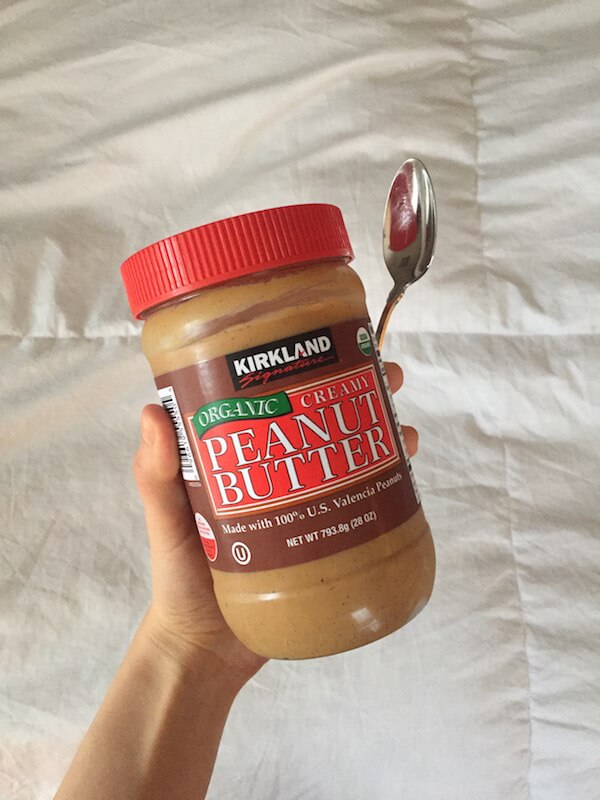 jar of peanut butter with a spoon