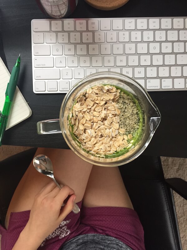 smoothie topped with oats and hemp hearts