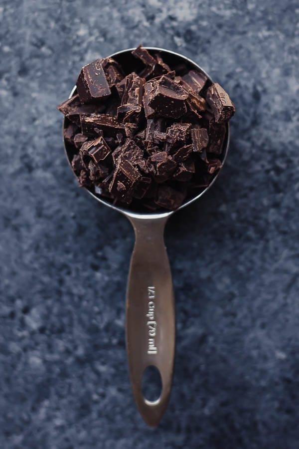 chopped chocolate in a measuring cup