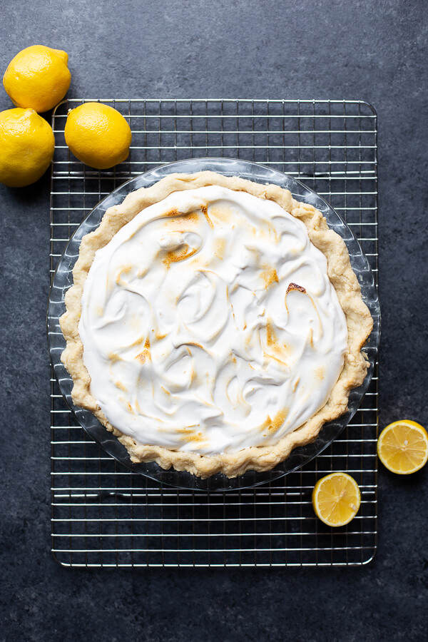 vegan lemon meringue pie on a cooling rack