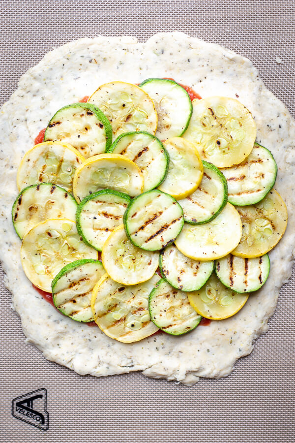 unbaked grilled zucchini crostata pizza