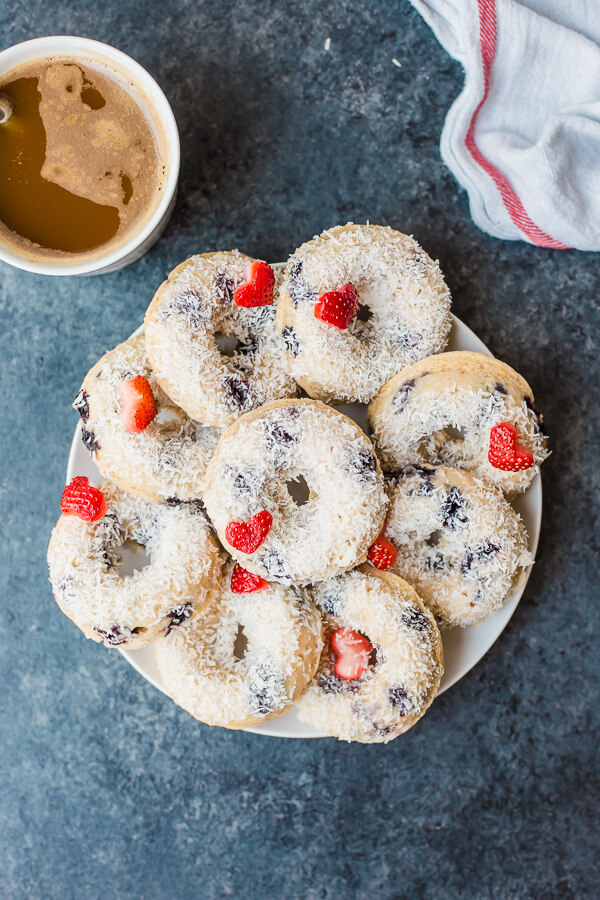 baked vegan blueberry donuts on a plate