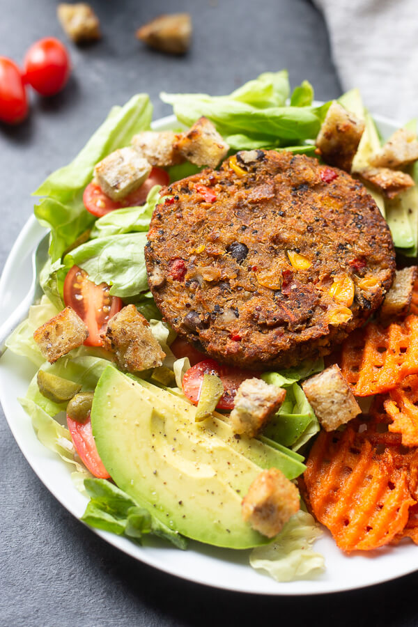 vegan veggie burger salad on a plate
