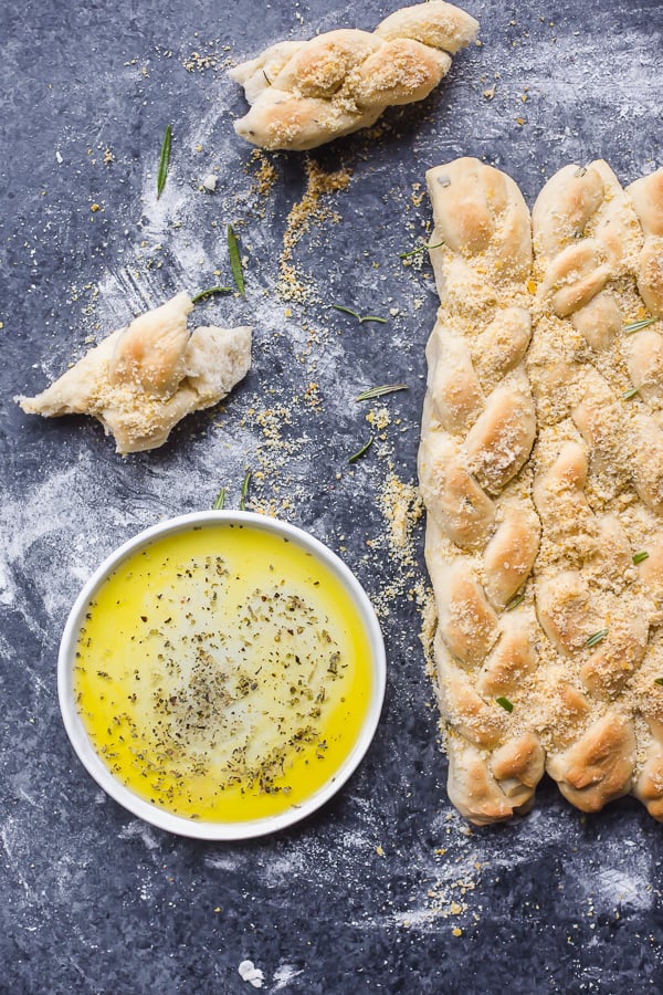 braided rosemary parmesan breadsticks with dipping oil