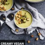 bowls of creamy vegan broccoli soup with text