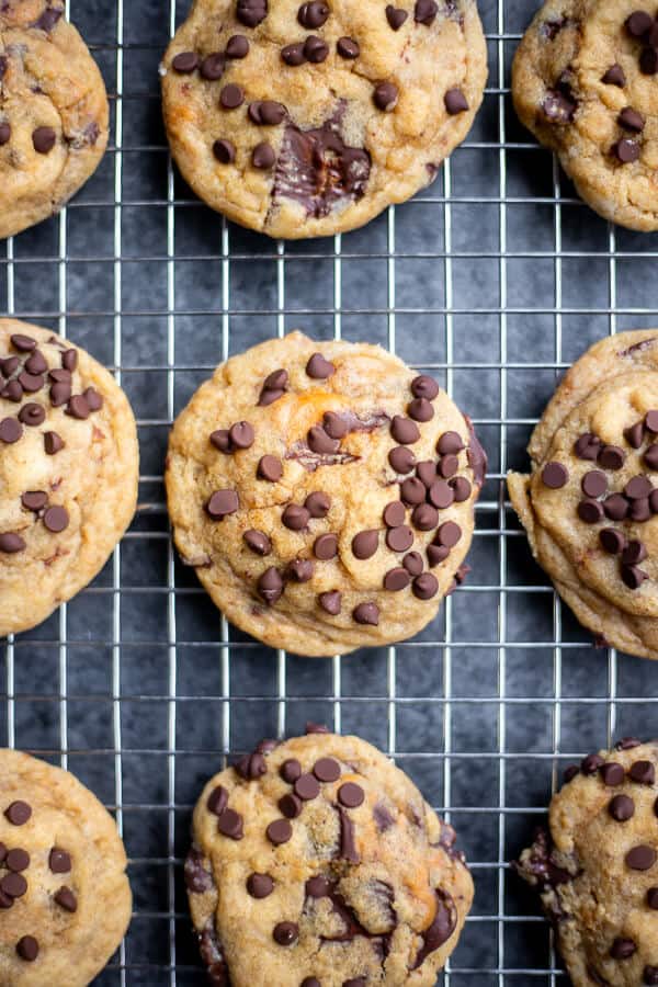 A cooling rack with Chewy Vegan Peanut Butter Cup Cookies cooling on top