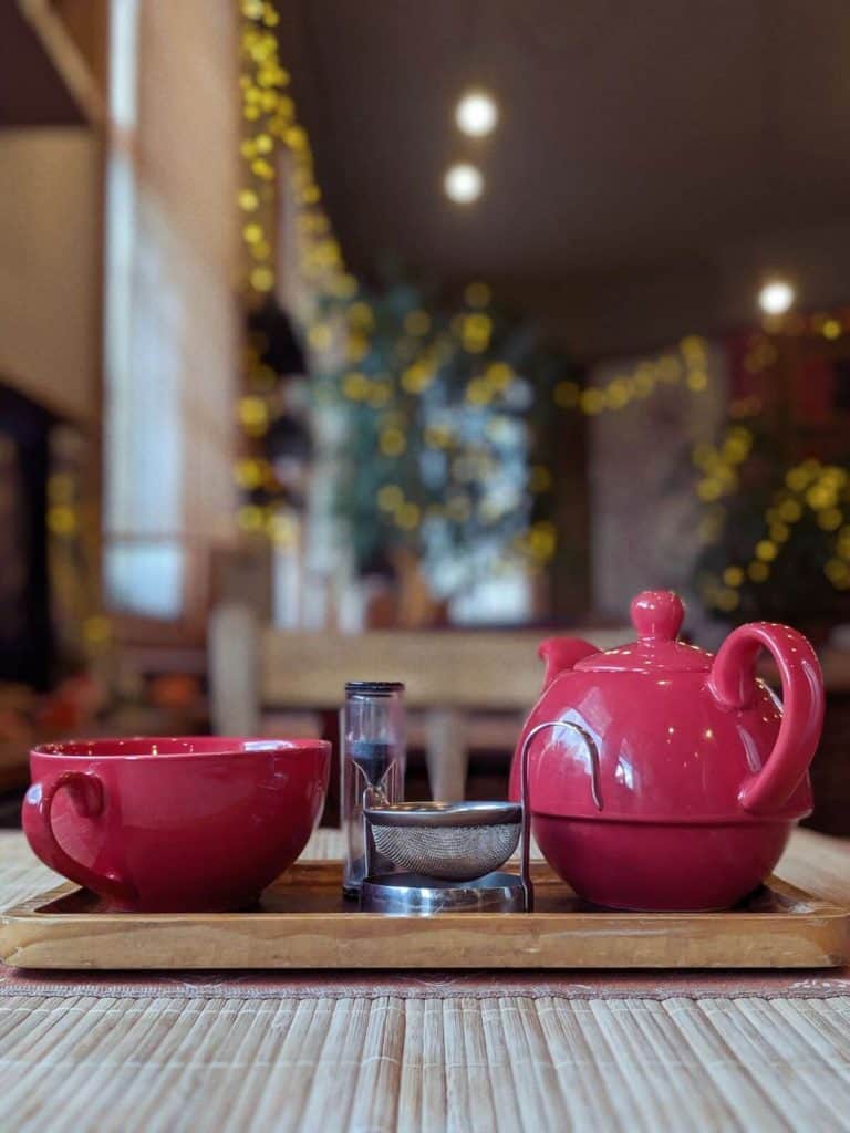 Red tea pot and cup at Sutra in Newcastle, UK