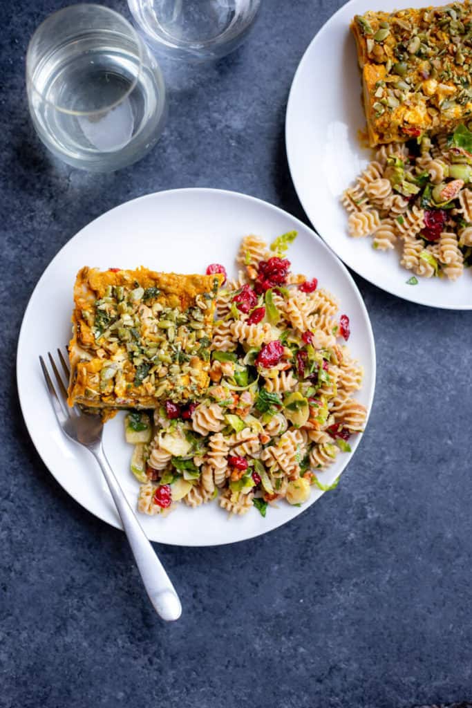 Vegan Fall Pasta Salad and Vegan Fall Lasagna on a plate with a fork