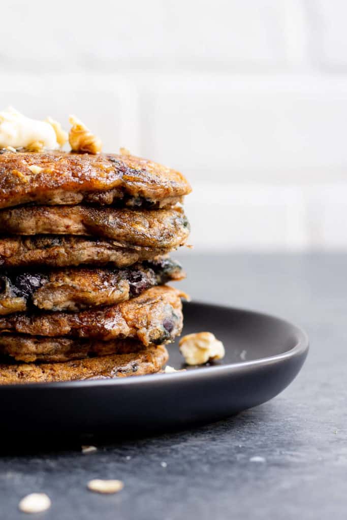 a close-up of a stack of dark brown pancakes