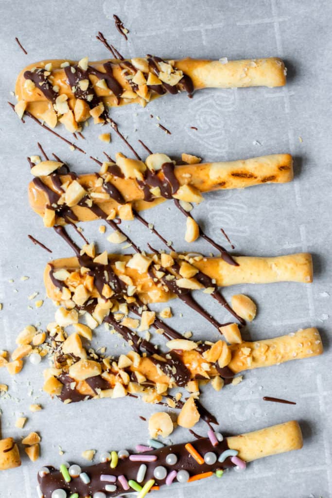 vegan chocolate peanut butter pretzels on a baking sheet