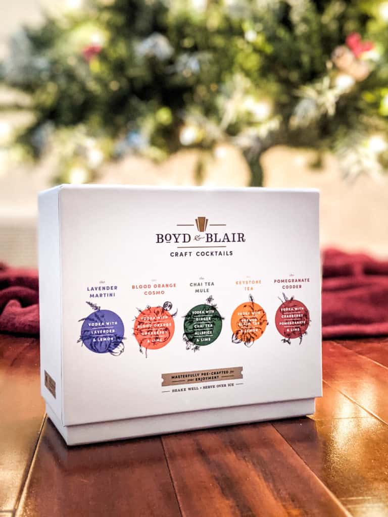 Boyd and Blair Craft Cocktail Flask Set box in front of a Christmas tree