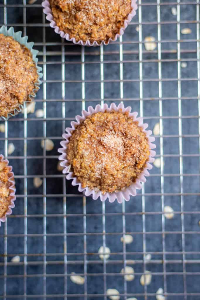 A top-down view of Vegan Blender Apple Spice Muffins on a cooling rack