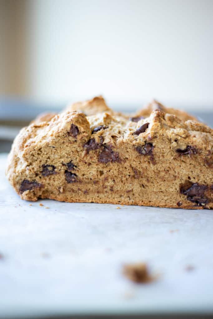 a cross-section of a stout chocolate chip soda bread loaf