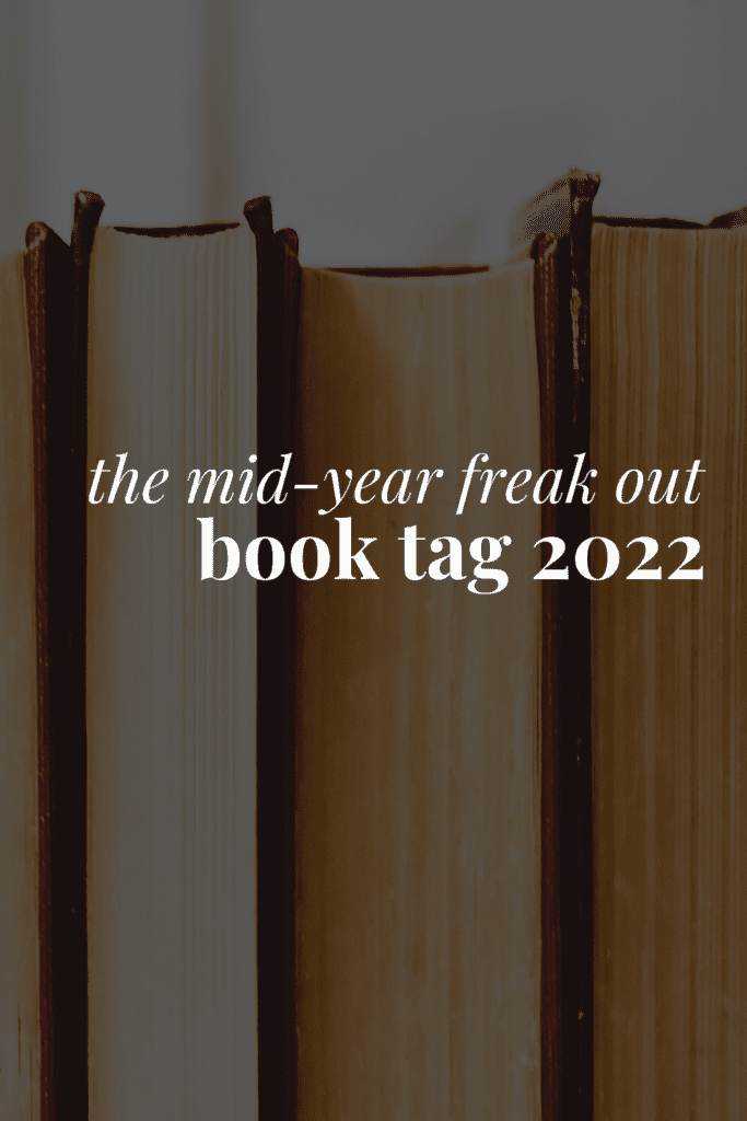 a stack of books and the title of this post 'the mid-year freak out book tag 2022'
