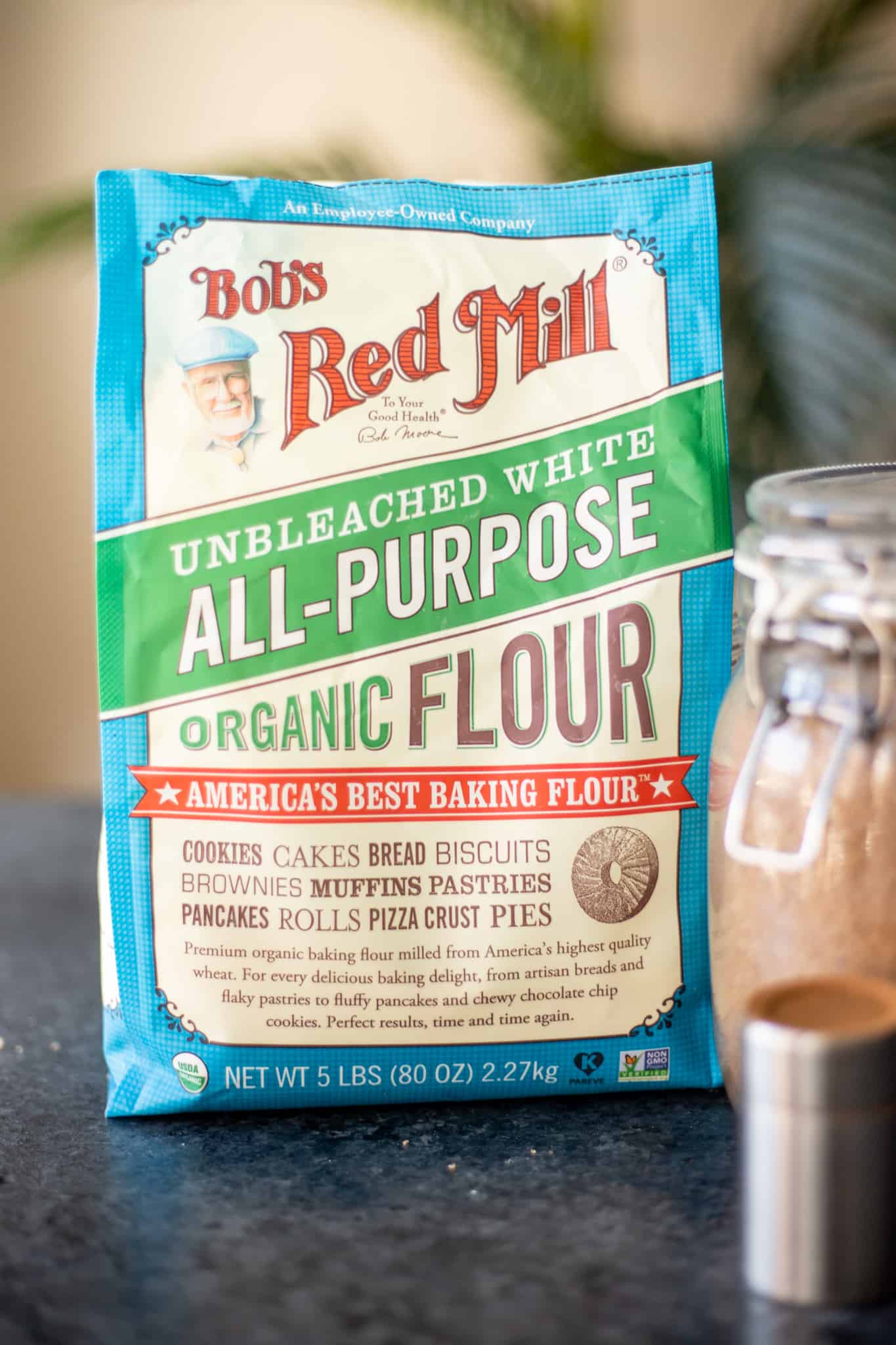 a bag of Bob's Red Mill's Organic All-Purpose Flour with some cinnamon and brown sugar