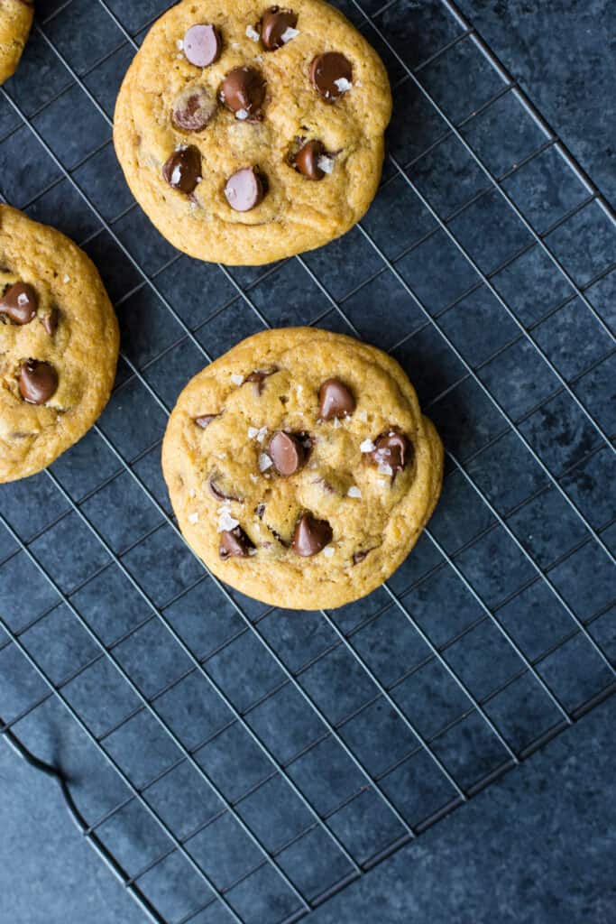 vegan chocolate chip cookies on a cooling rack