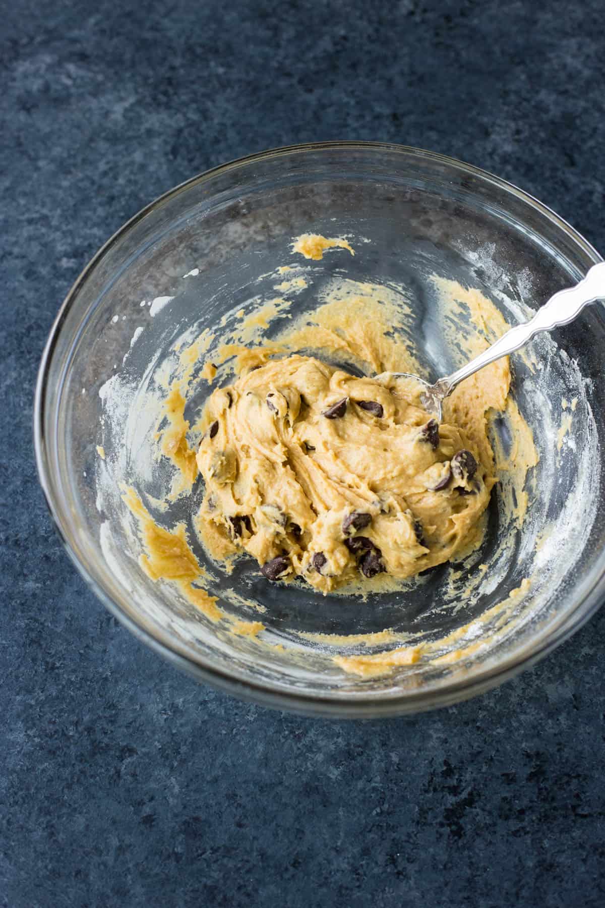 vegan chocolate chip cookie dough in a glass bowl