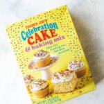 Trader Joe's Celebration Cake and Baking Mix box on a white background