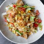 A vegan panzanella salad in a light bowl