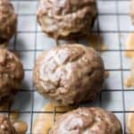 Peanut butter-glazed chocolate cookies on a cooling rack